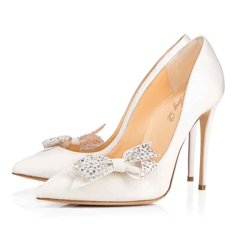 Pointed toe high heel pump with rhinestone bow embellishment